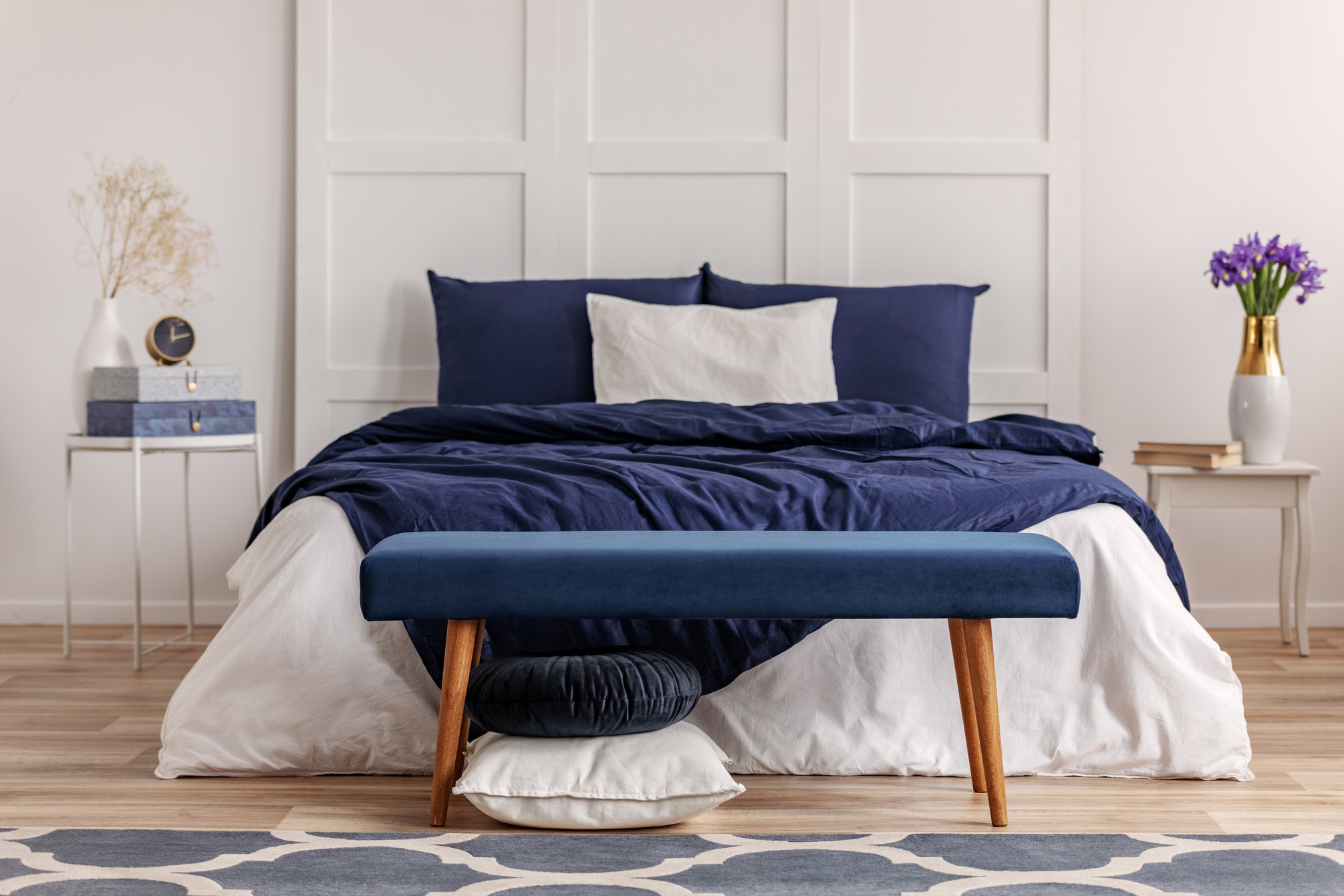 Navy blue bedroom interior in scandinavian apartment